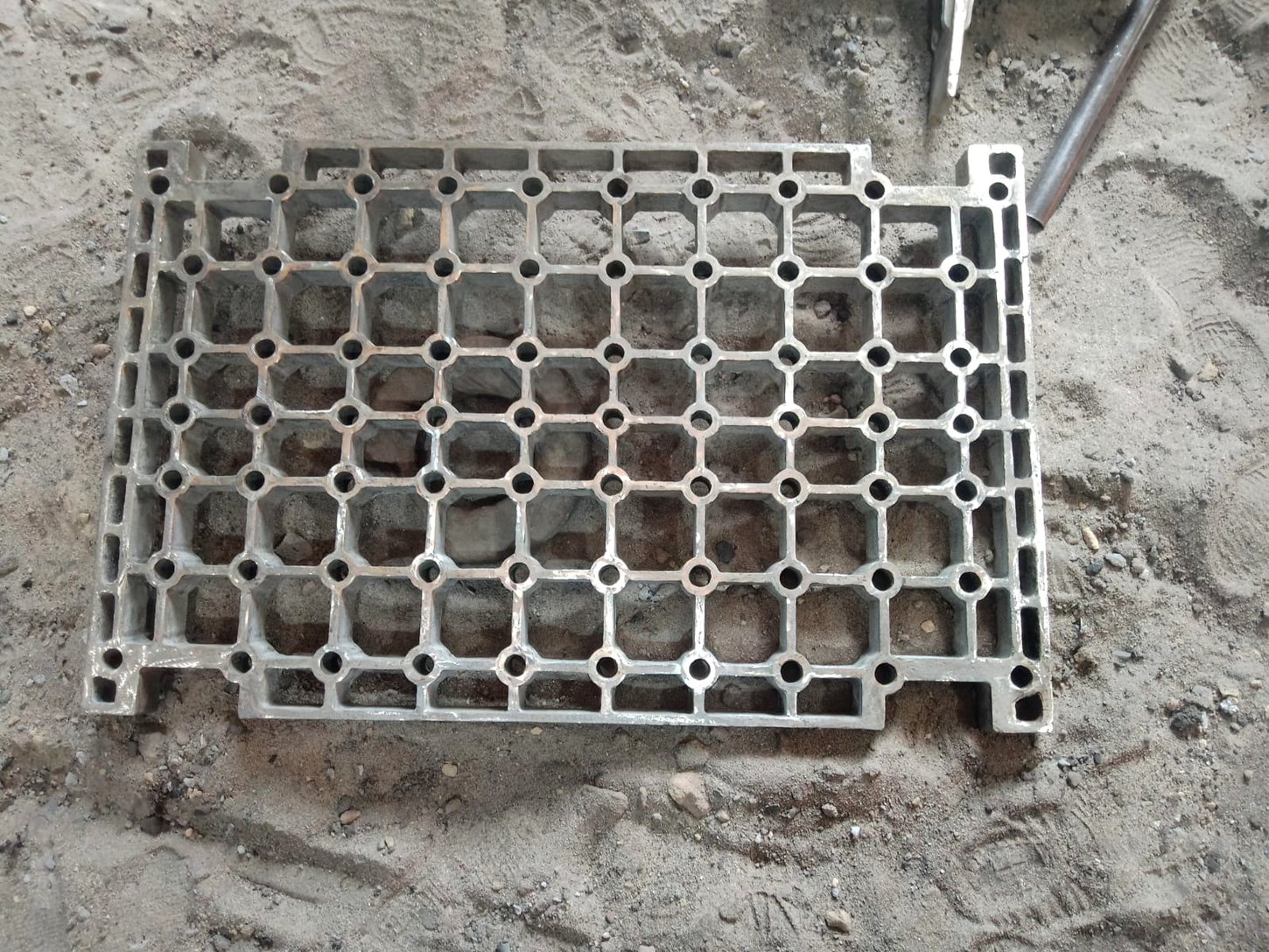 Industrial cast tray manufactured by Nittand Casting Works